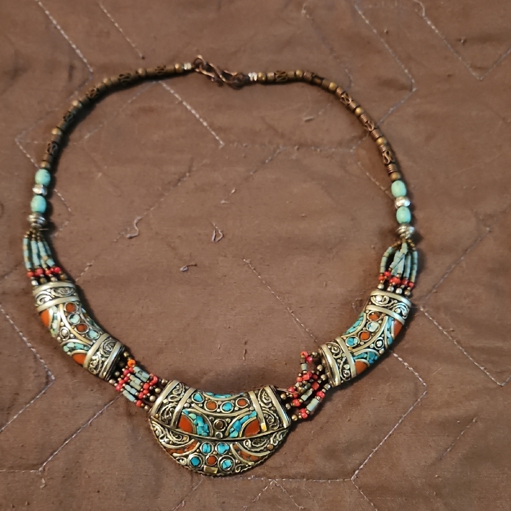 Vibrant Blue and Red Necklace with Intricate Metalwork